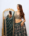 alt message - Mohey Women Stunning Teal Green Georgette Crop Top Lehenga with Jaal Border image number 1